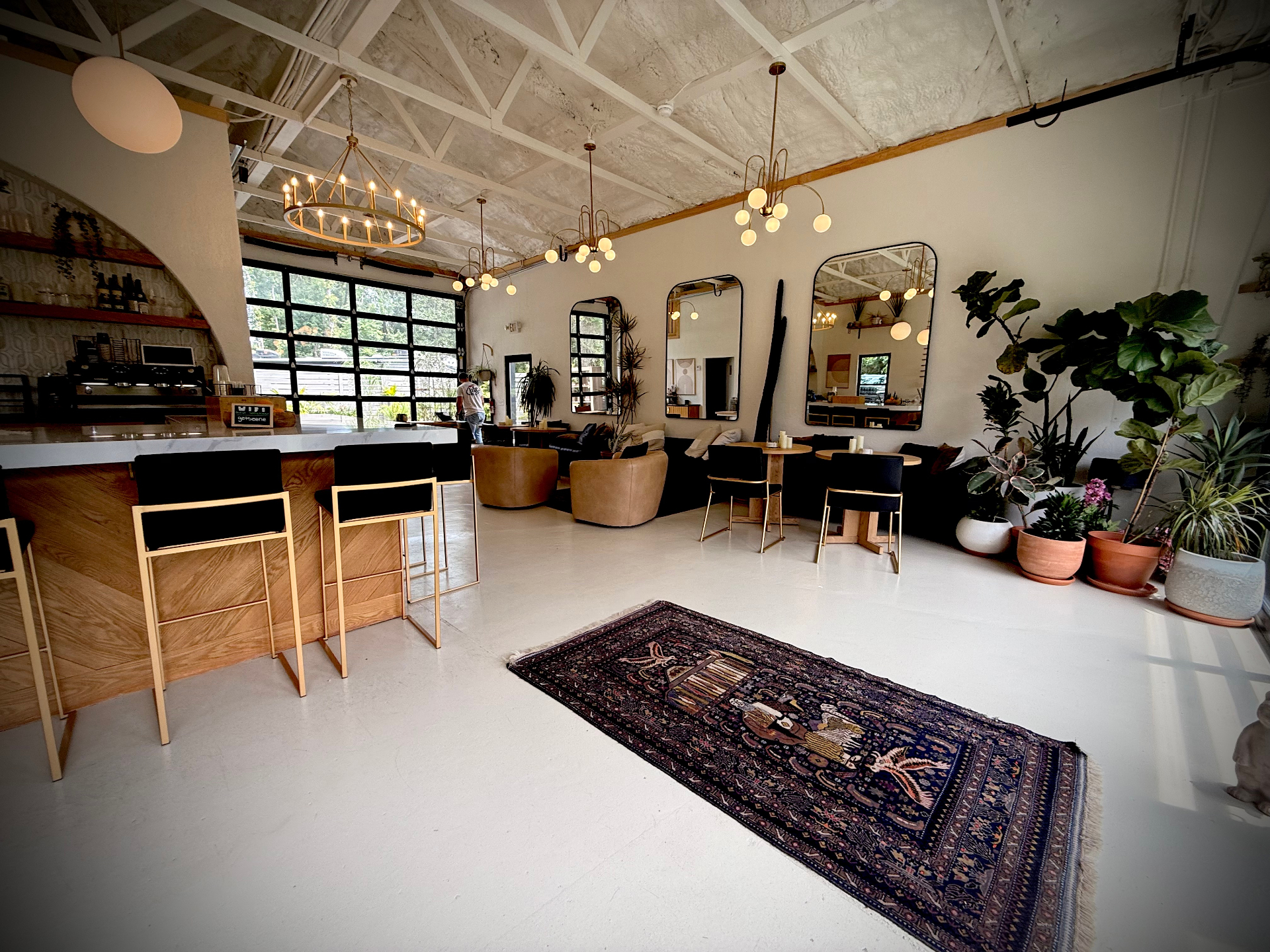 Seene House coffee bar with marble counter and warm oak
