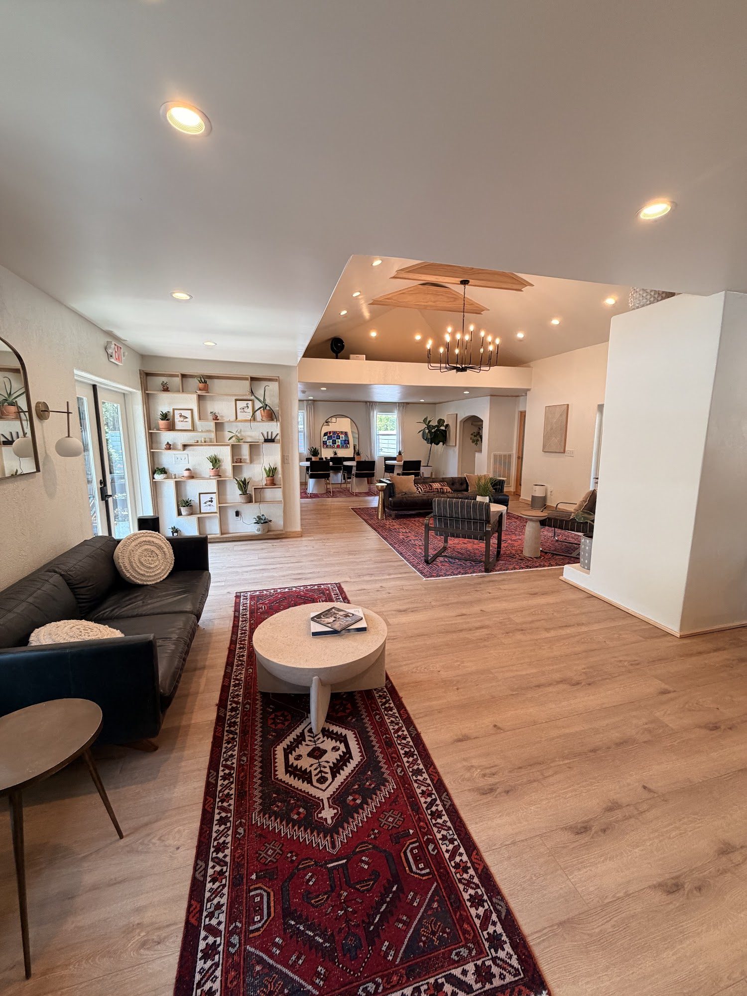 Sitting area with layered rugs