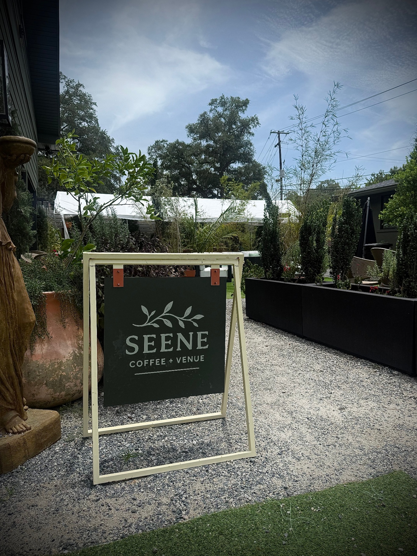 Seene House garden sign in the courtyard